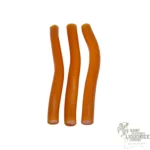 Apricot candy sticks – three soft orange Swedish candy sticks with pink fondant centres